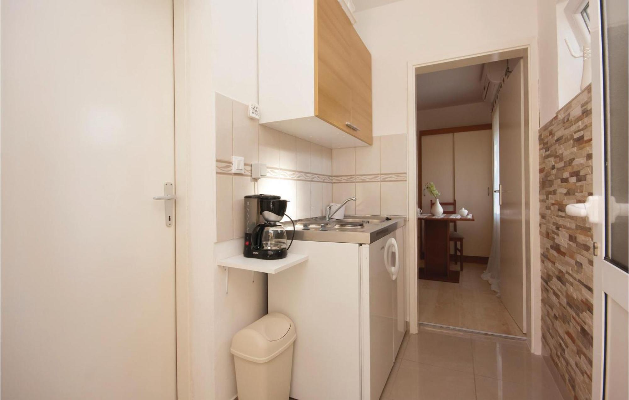 Nice Apartment In Raslina With House Sea View Eksteriør bilde