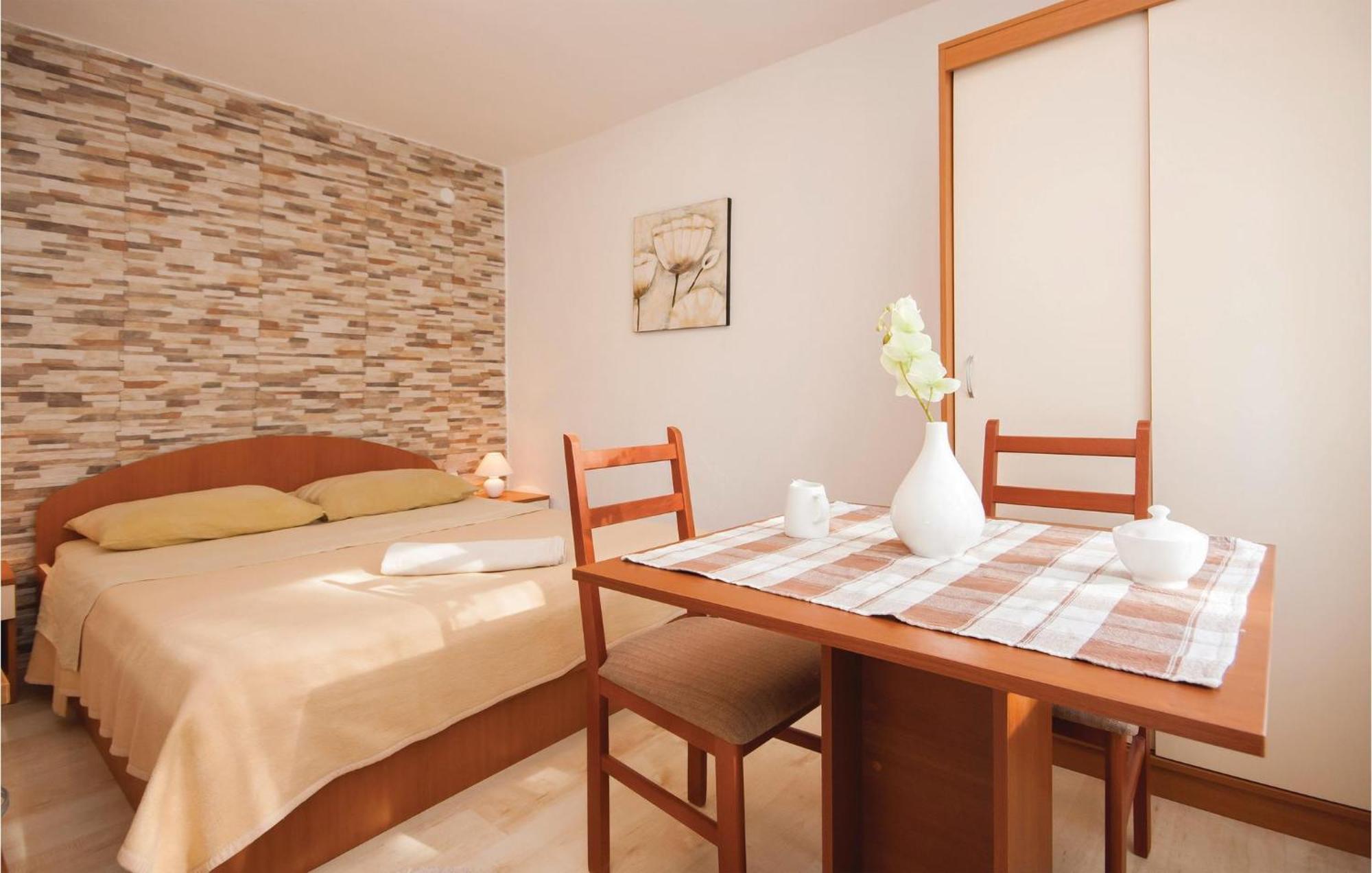 Nice Apartment In Raslina With House Sea View Eksteriør bilde