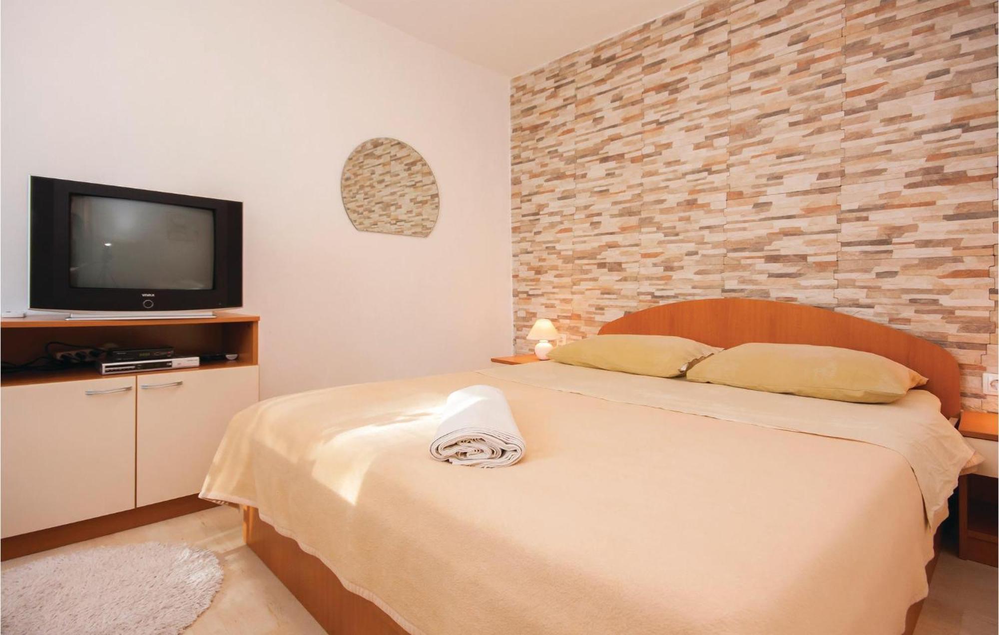 Nice Apartment In Raslina With House Sea View Eksteriør bilde