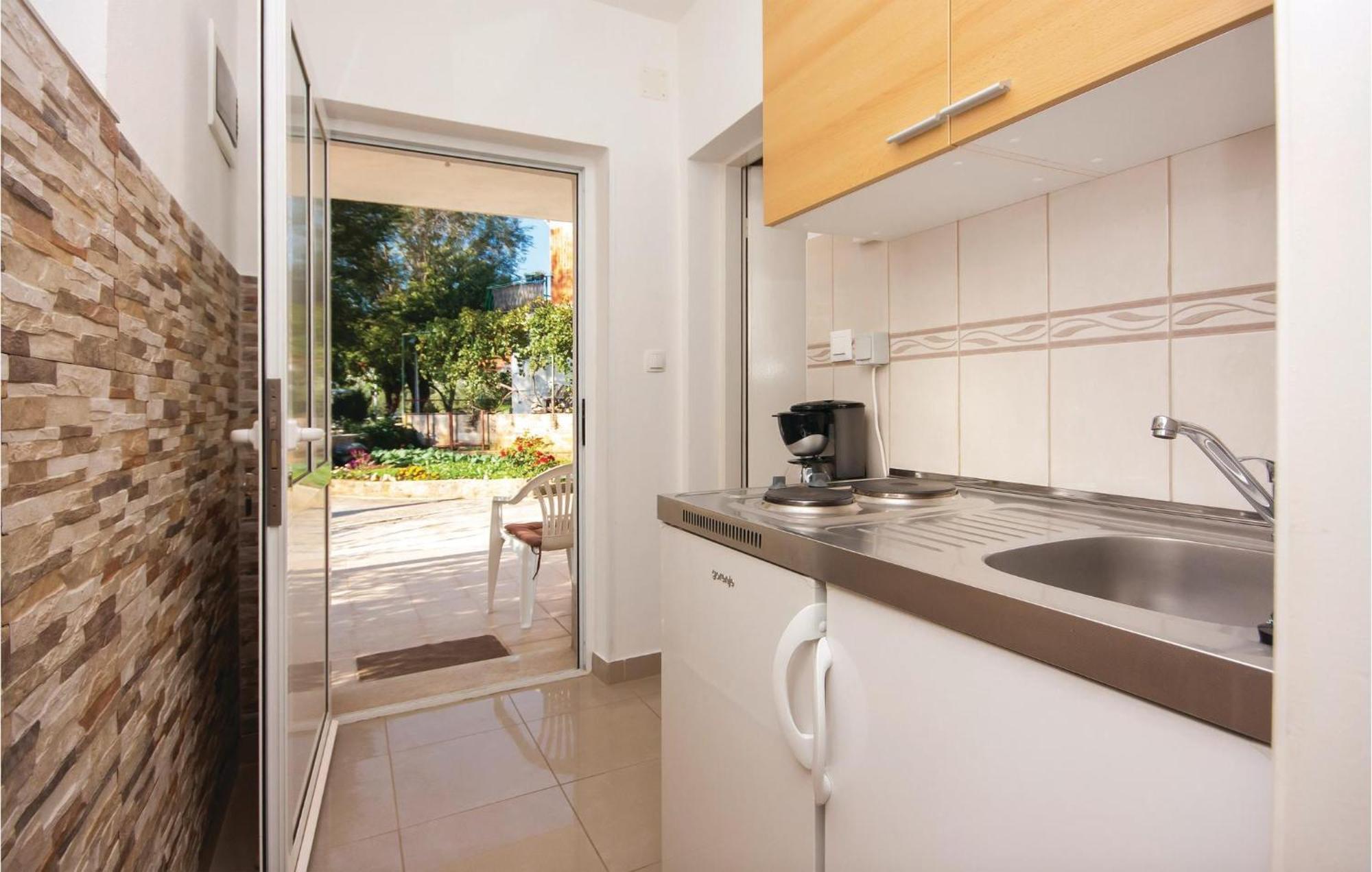 Nice Apartment In Raslina With House Sea View Eksteriør bilde